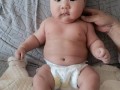新生儿满月长了两斤半
